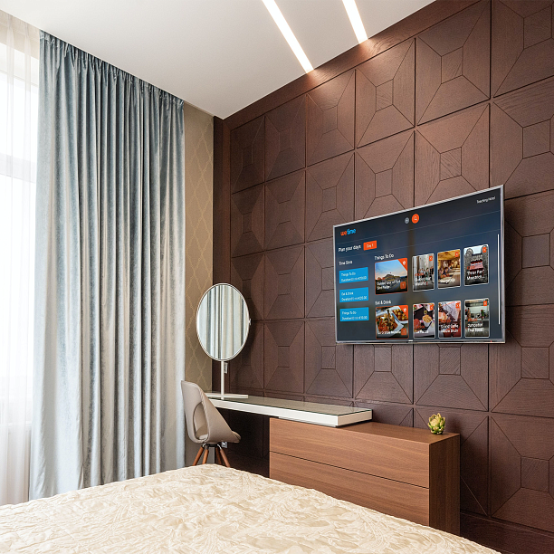 Photo 2 - AI concierge on hotel TVs, boosting experience and revenue.